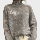 Corinne - Künstlerischer Strick-Turtleneck-Pullover